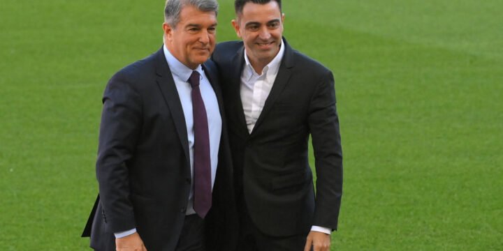 Joan Laporta and Xavi Hernandez
