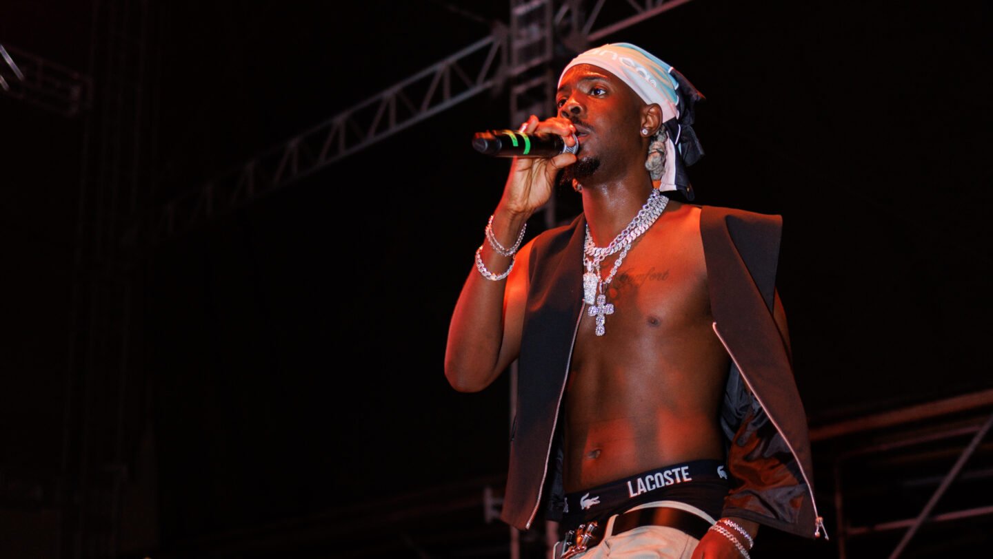 Young Jonn performing on stage at the Tribeville Festival 2024