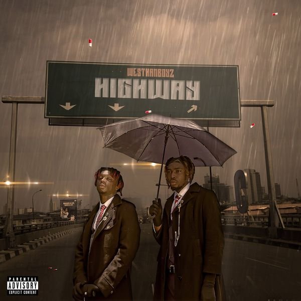 The cover art for Highway by WesthanBoyz features a dramatic, rainy cityscape. In the foreground, two men stand side by side, dressed in dark overcoats and ties. One of them holds a large black umbrella. The rain pours down heavily, adding a sense of urgency and moodiness to the scene. Behind them, a large highway sign reads 